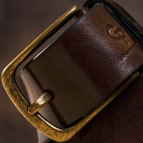Ремінь чоловічий з круглою латуніевой пряжкою Grande Pelle 11269 Червоно-коричневий 11269 фото