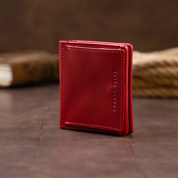 Вертикальное глянцевое портмоне с накладной монетницей GRANDE PELLE 11331 Красное 11331 фото