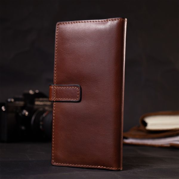 Интересный вертикальный кошелек из натуральной кожи GRANDE PELLE 11660 Коричневый 56466 фото