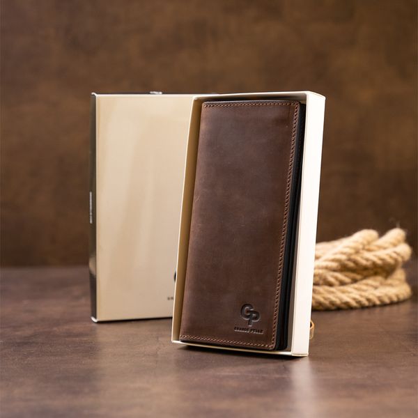 Вертикальний гаманець матовий на магнітній кнопці GRANDE PELLE 11314 Шоколадний 11314 фото