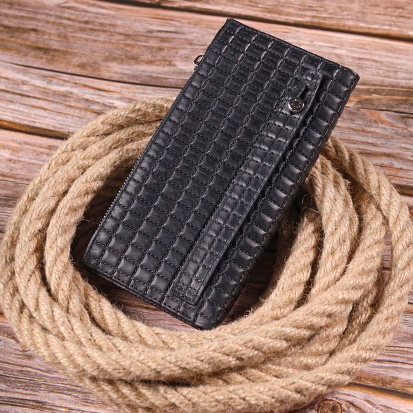 Стеганий вертикальний чоловічий гаманець з натуральної шкіри KARYA 21425 Чорний 21425 фото