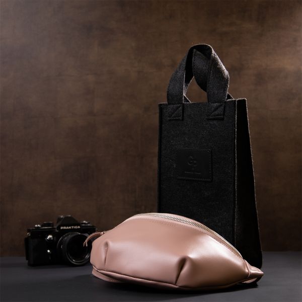 Практичная кожаная женская поясная сумка GRANDE PELLE 11359 Розовый 49887 фото